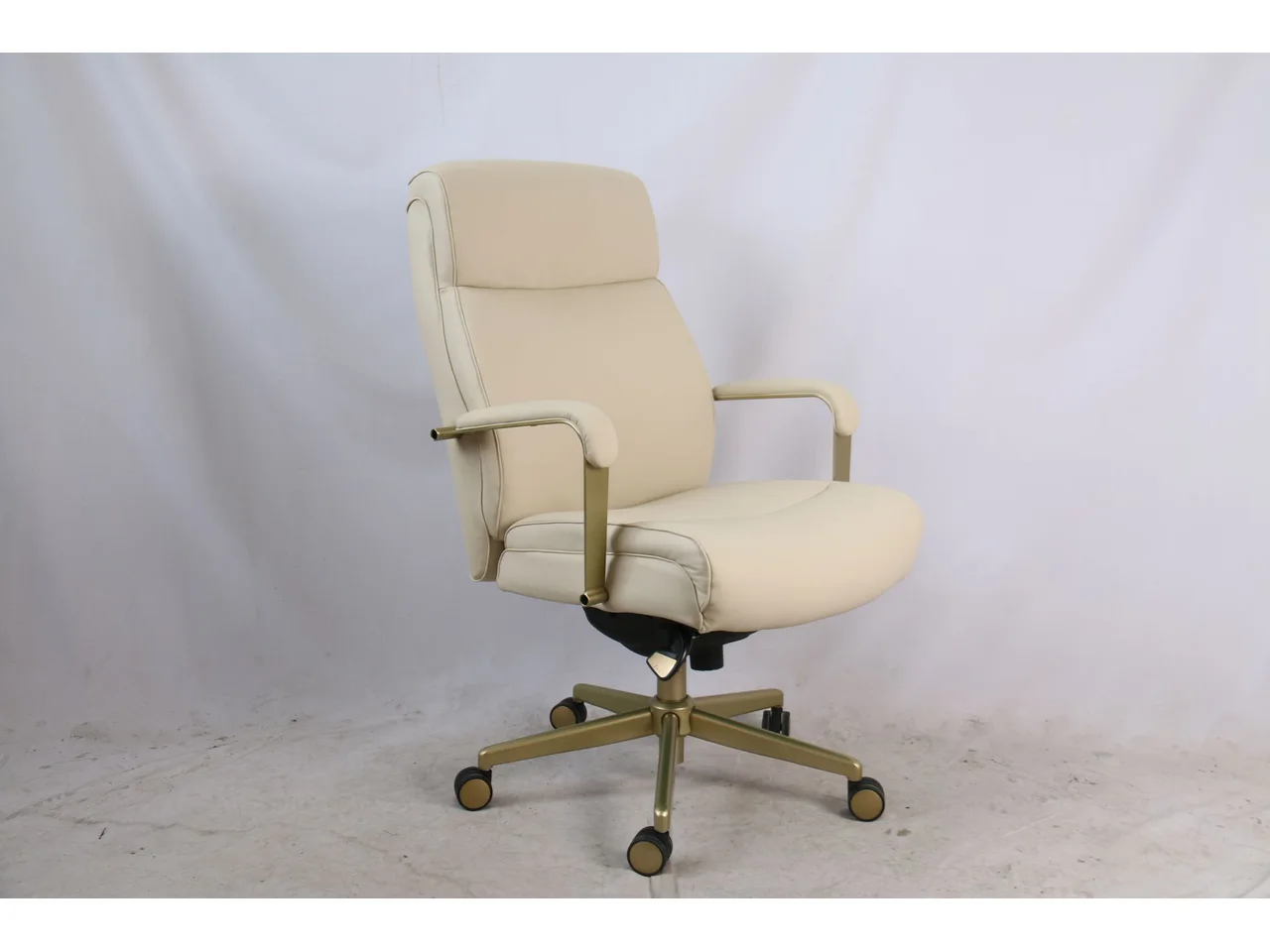 Daming cream high-back executive office chair on a polished aluminium base